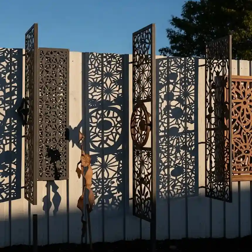 10. Shadow Play Fence Art
